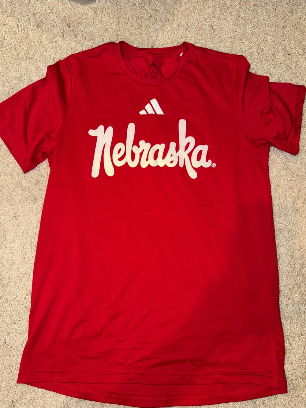 adidas Red Nebraska Script Tee with White Logo
Unisex